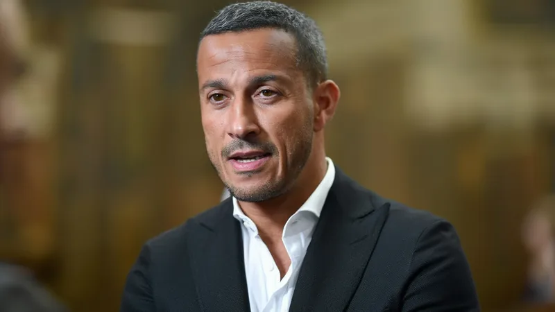 Thiago Alcantara speaking in an interview, discussing his coaching badges