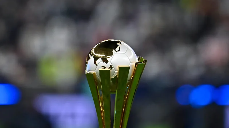 Soccer players competing for the ball during a match, with stadium lights in the background. — latest news and analysis.