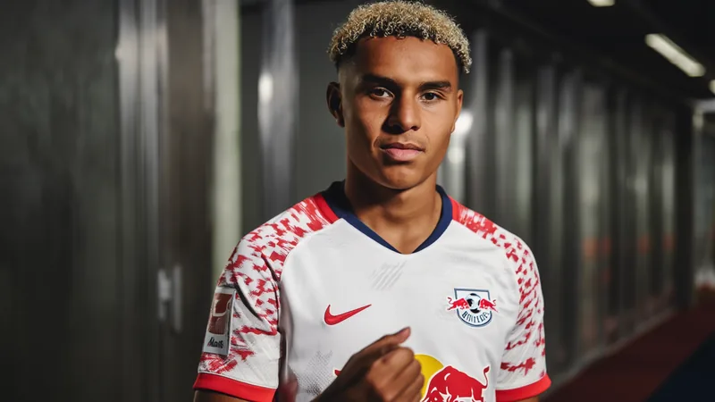 Antonio Nusa Denies Summer Exit Reports, Commits to Leipzig Antonio Nusa in RB Leipzig kit, denying transfer rumors.