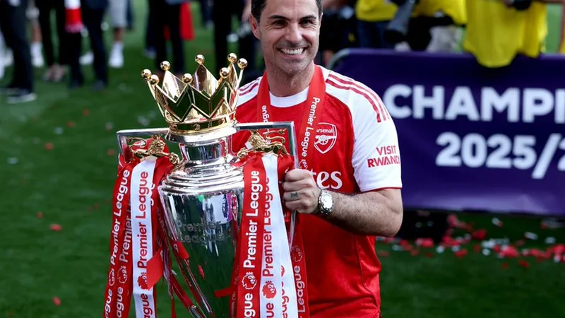 Arsenal manager Mikel Arteta during a Premier League match, with the Emirates Stadium in the background. — latest news and analysis.