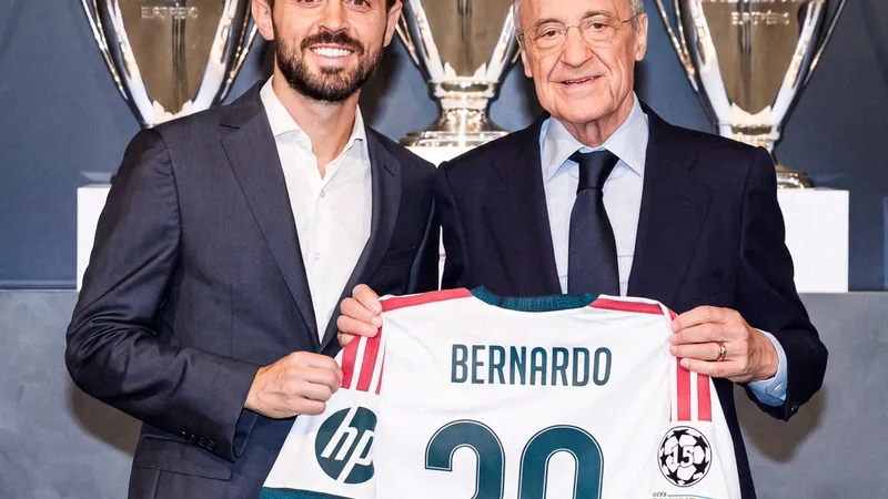 Bernardo Silva holding a Real Madrid jersey during his presentation with Florentino Pérez.