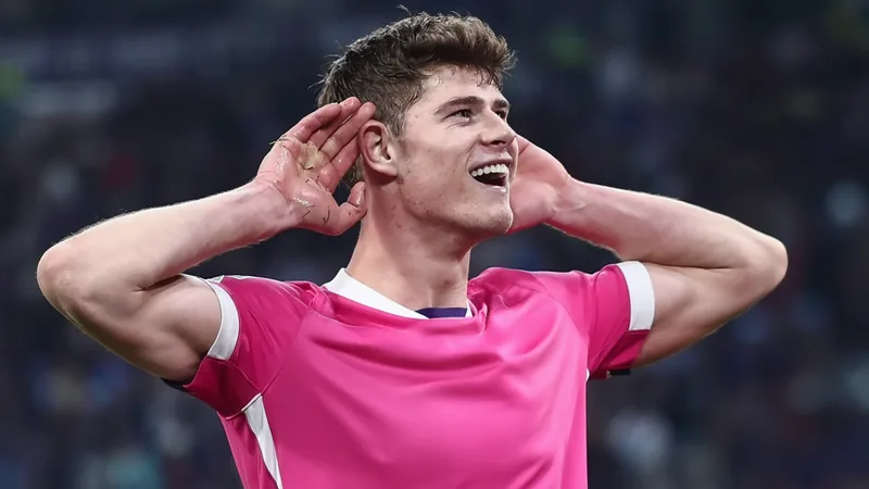 Charlie Cresswell Medical Ahead of Rennes Move Charlie Cresswell in action during a football match, wearing a Toulouse jersey.