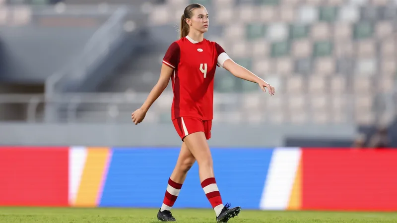 Chloe Taylor in action for Canada at the U-17 Women's World Cup, showcasing her skills on the ball. — latest news and analysis.