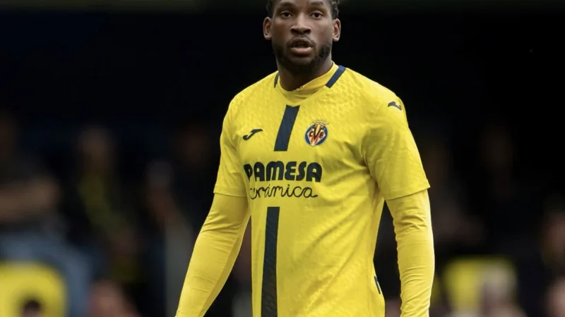 Willy Kambwala in action during a football match, with Como and Villarreal logos in the background. — latest news and analysis.