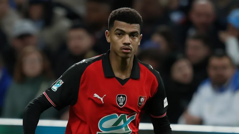 Abdelhamid Ait Boudlal in action for Rennes during a Ligue 1 match, with Fulham's interest in the defender highlighted. — latest news and analysis.