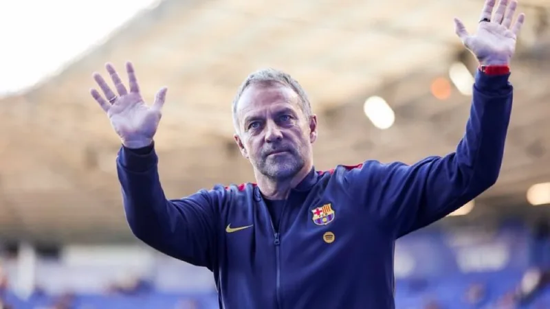 Flick hints at more Barcelona signings — latest news and analysis Hansi Flick speaking at a press conference, hinting at potential new signings for Barcelona. — latest news and analysis.