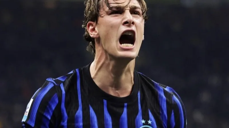 Inter Close to New Deal for Pio Esposito Until 2031 Pio Esposito in an Inter jersey during a match, with the San Siro stadium in the background. — latest news and analysis.