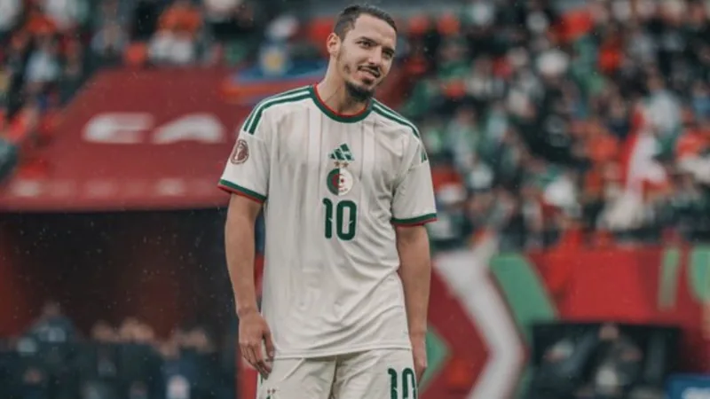 Bennacer Leaves AC Milan, Joins Al Gharafa Ismael Bennacer in AC Milan kit, with Al Gharafa logo in background