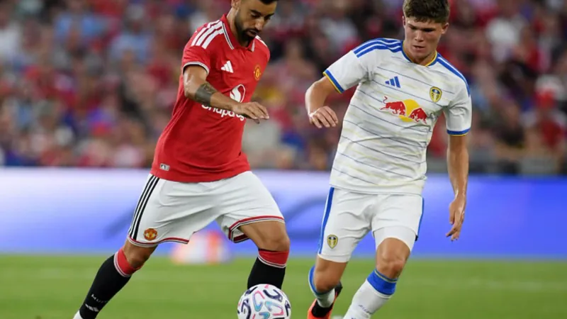 Alfie Cresswell in Leeds United kit during a match, with the club crest visible.