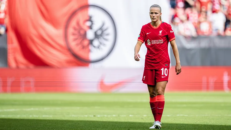 Liverpool's Lundgaard Joins Eintracht Frankfurt Sofie Lundgaard in Liverpool kit, with Eintracht Frankfurt logo in background