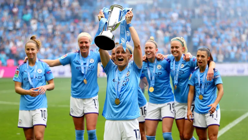 Manchester City players celebrating with the WSL trophy, with captain Alex Greenwood lifting it. — latest news and analysis.