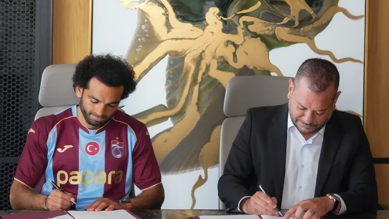 Mo Salah Signs for Trabzonspor Until 2028 Mo Salah in Trabzonspor jersey signing contract