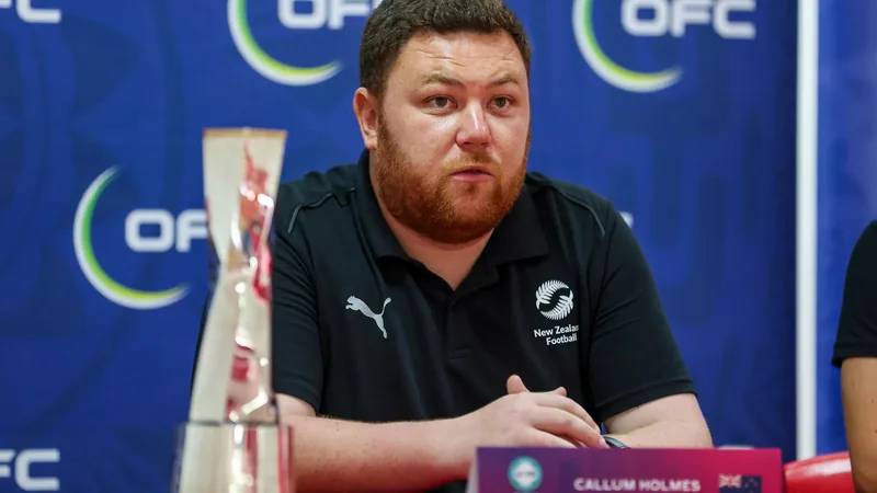 Callum Holmes, head coach of New Zealand's U-20 women's team, speaks at a press conference ahead of the FIFA U-20 Women's World Cup in Poland.