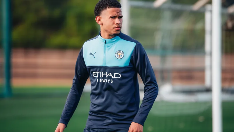 Savinho in Manchester City training kit, looking focused during a session.
