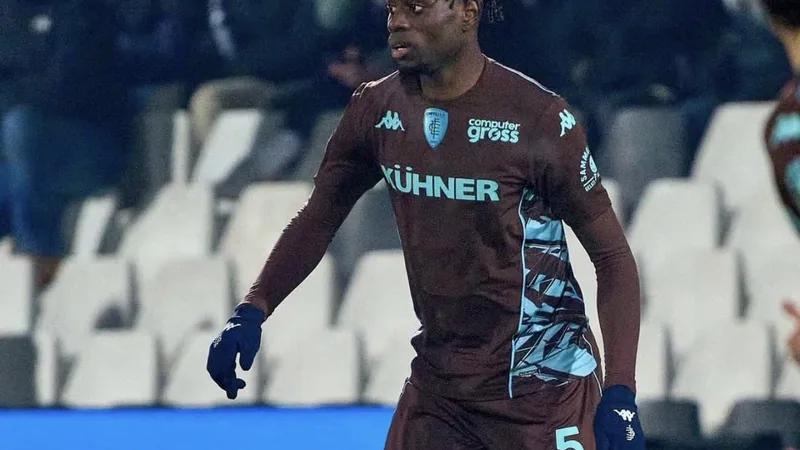 Sturm Graz Bid for Napoli Defender Obaretin Soccer ball on a pitch, representing a transfer bid for defender Nosa Edward Obaretin.