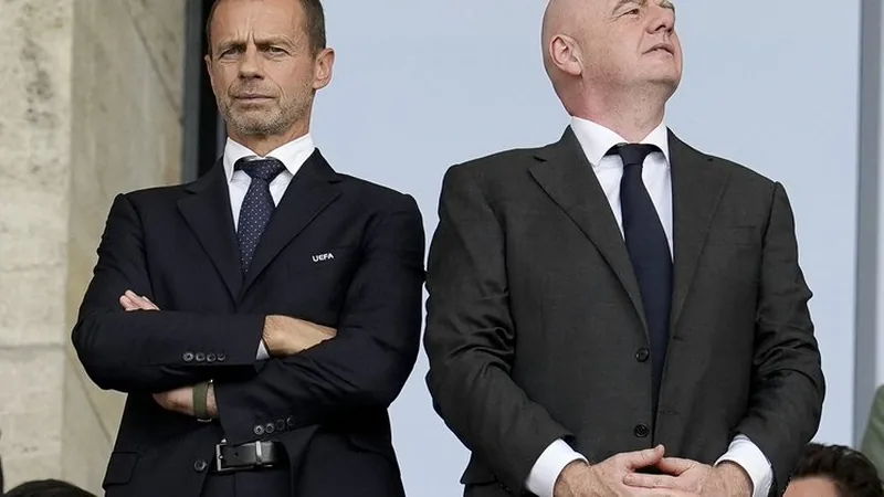UEFA Escalates FIFA Boycott to Challenge Infantino UEFA and FIFA logos side by side, symbolizing the ongoing conflict between the two football governing bodies. — latest news and analysis.