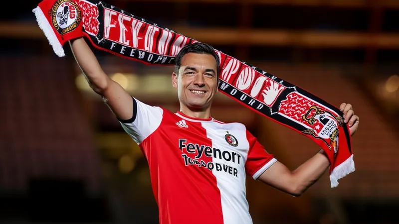 Giovanni van Bronckhorst kehrt als Cheftrainer zu Feyenoord zurück Giovanni van Bronckhorst im Trainingsanzug von Feyenoord auf dem Rasen der De Kuip, im Hintergrund die Stadiontribünen — latest news and analysis.