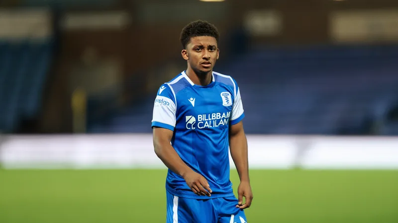 Demarai Gray in Birmingham City kit, looking focused on the pitch.