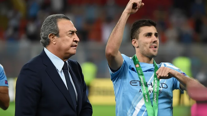 Real Madrid Not Expected to Advance for Rodri This Summer Real Madrid's Florentino Pérez and Manchester City's Rodri in a football stadium setting.