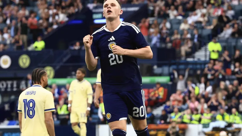 World Cup Fantasy: Warm-Up Stars to Watch Soccer players in action during a World Cup warm-up match, with fans in the background.
