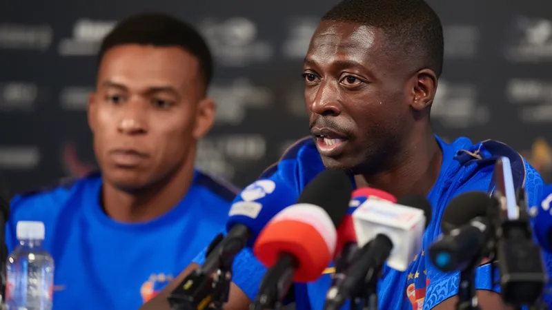 Kylian Mbappé y Ousmane Dembélé celebrando un gol con la camiseta del Paris Saint-Germain en el Parque de los Príncipes — latest news and analysis.