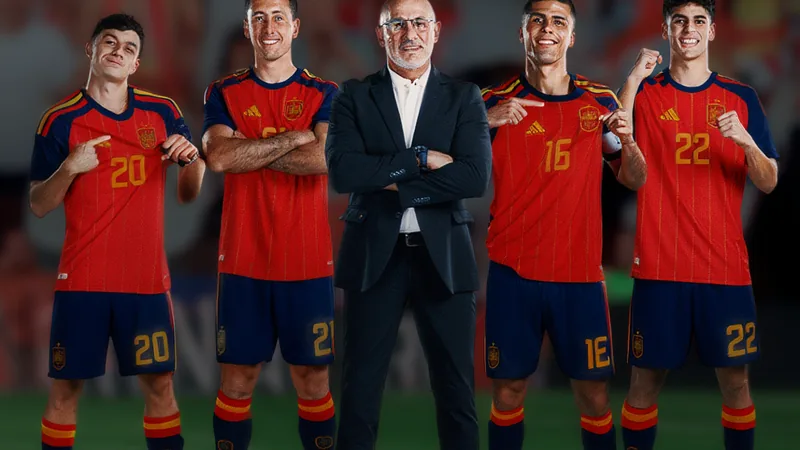 España avanza a las Semifinales de la Copa Mundial — Football World Jugadores de la selección española de fútbol celebrando en el campo tras ganar el partido de cuartos de final de la Copa Mundial, con banderas rojas