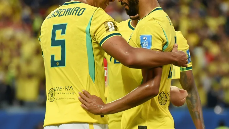 Joueurs brésiliens célébrant leur qualification avec le drapeau national sur la pelouse du stade au Qatar — latest news and analysis.