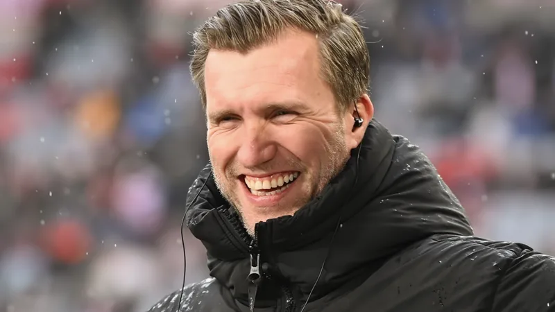 Markus Krösche, directeur sportif de l'Eintracht Francfort, en costume-cravate lors d'un match au Deutsche Bank Park. — latest news and analysis.
