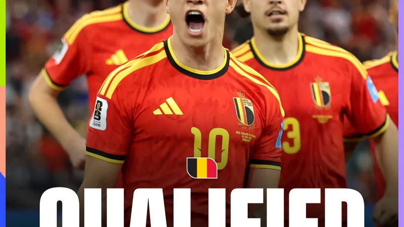 Joueurs de l'équipe de Belgique célébrant leur qualification sur la pelouse, avec le drapeau belge en arrière-plan. — latest news and analysis.