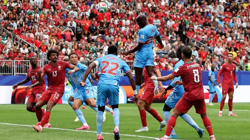 Yoane Wissa célébrant son but historique pour la RDC lors du match de Coupe du Monde contre le Maroc au Qatar. — latest news and analysis.
