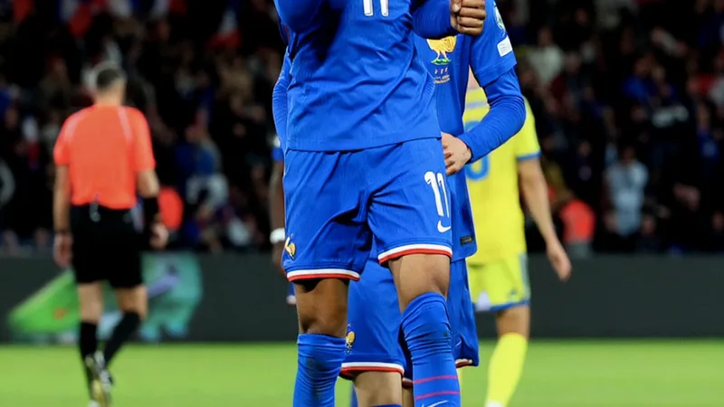 Michael Olise marca hat-trick em amistoso pela França — Football Michael Olise comemora um gol pela seleção francesa em um estádio lotado à noite, com a torcida vibrando ao fundo. — latest news and analysis.