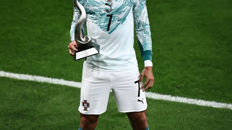 Cristiano Ronaldo eleito Melhor em Campo pela FIFA — Football World Cristiano Ronaldo comemora um gol com a camisa de Portugal no Estádio da Luz, em Lisboa, sob luzes noturnas. — latest news and analysis.